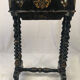 Napoleon III work table in blackened burgundy wood with gilded highlights.