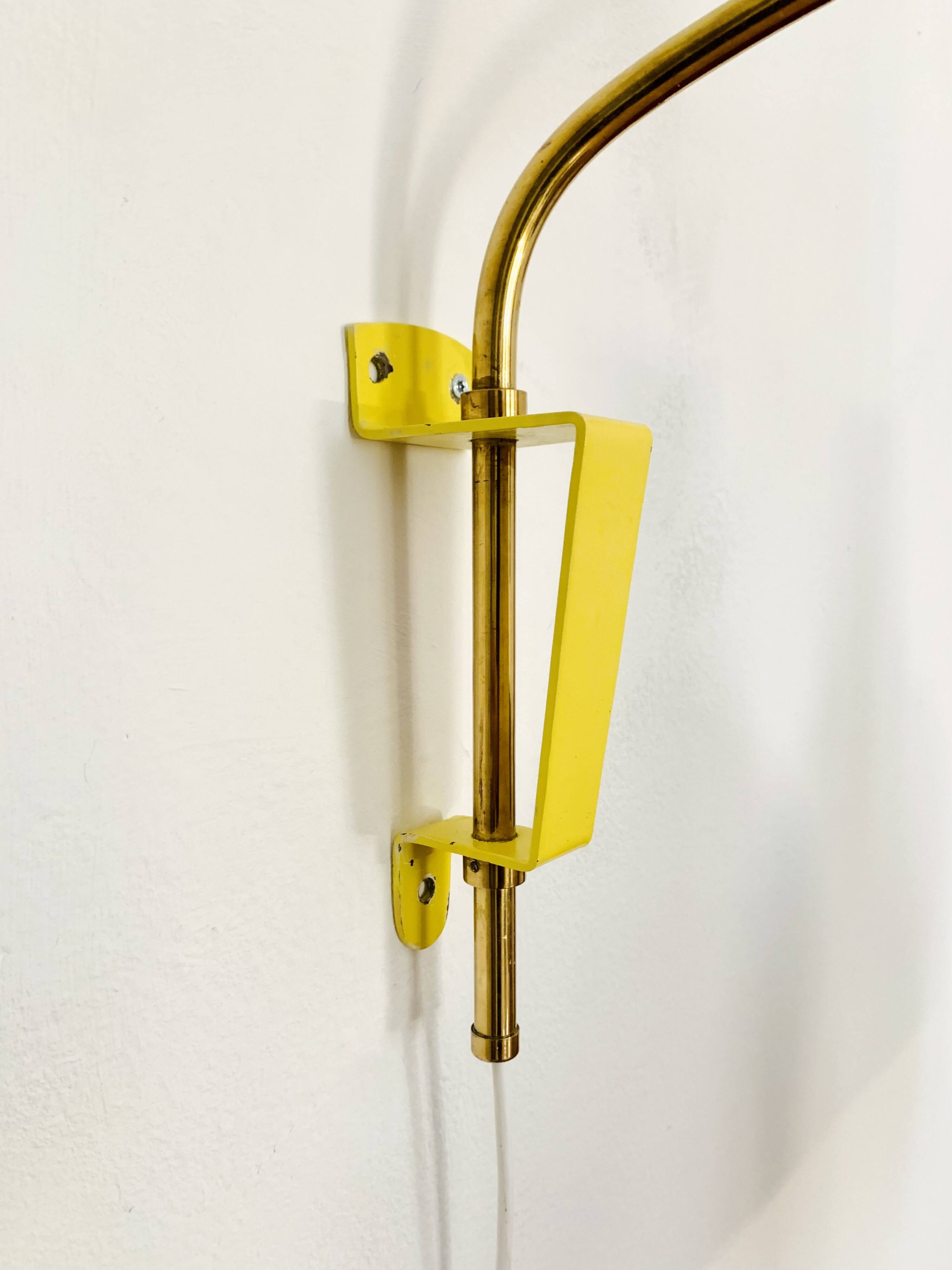 Adjustable Brass and Wicker Arc Sconce