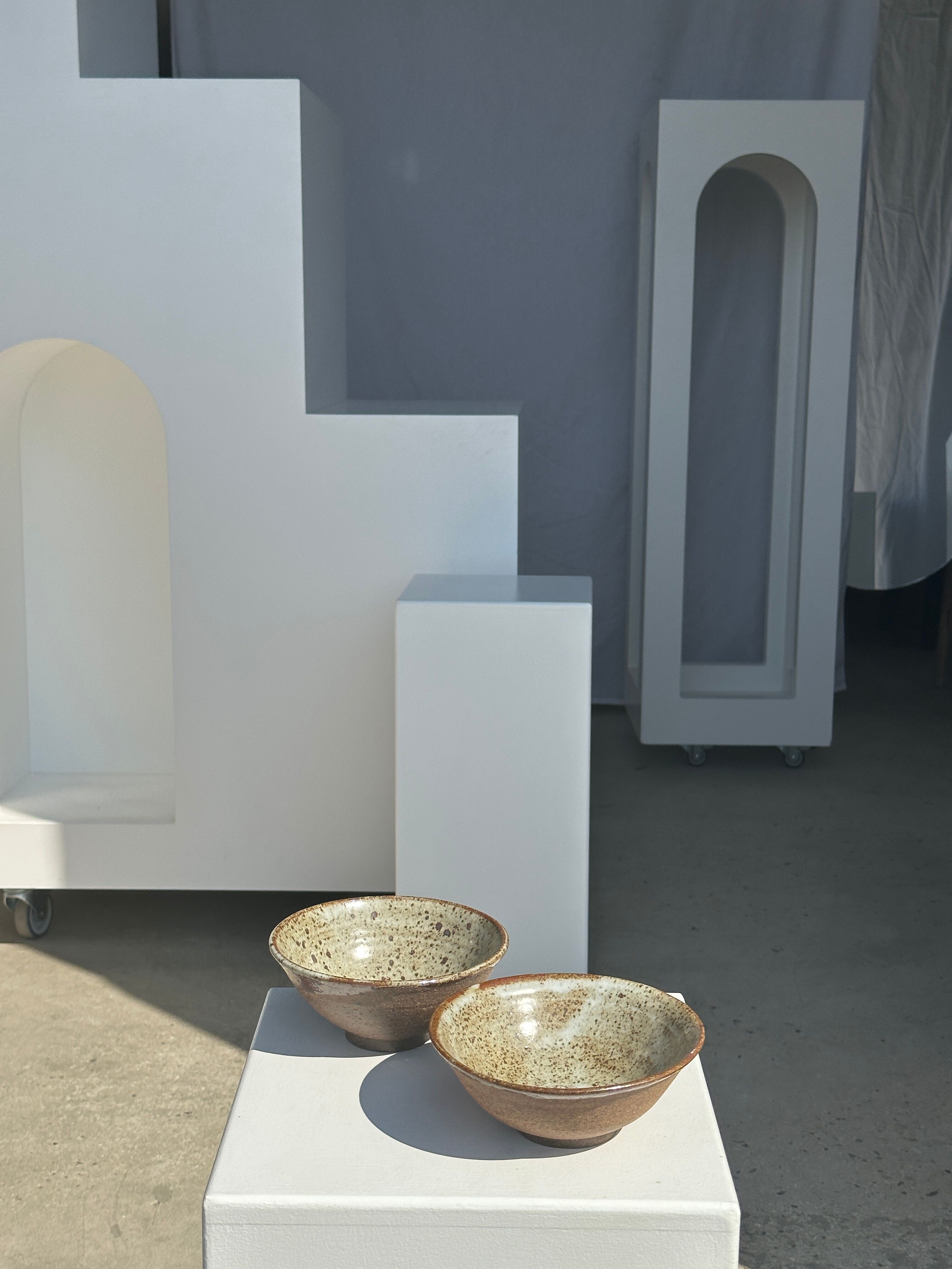Duo of ceramic bowls interior glazed exterior matt raw earth
