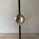 Vintage black metal tripod floor lamp and brass ball