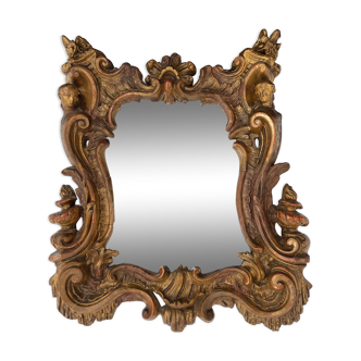 ANTIQUE MIRROR - XVIIIth century - Carved and gilded wood - decoration of rinceaux - shells - Rocaille