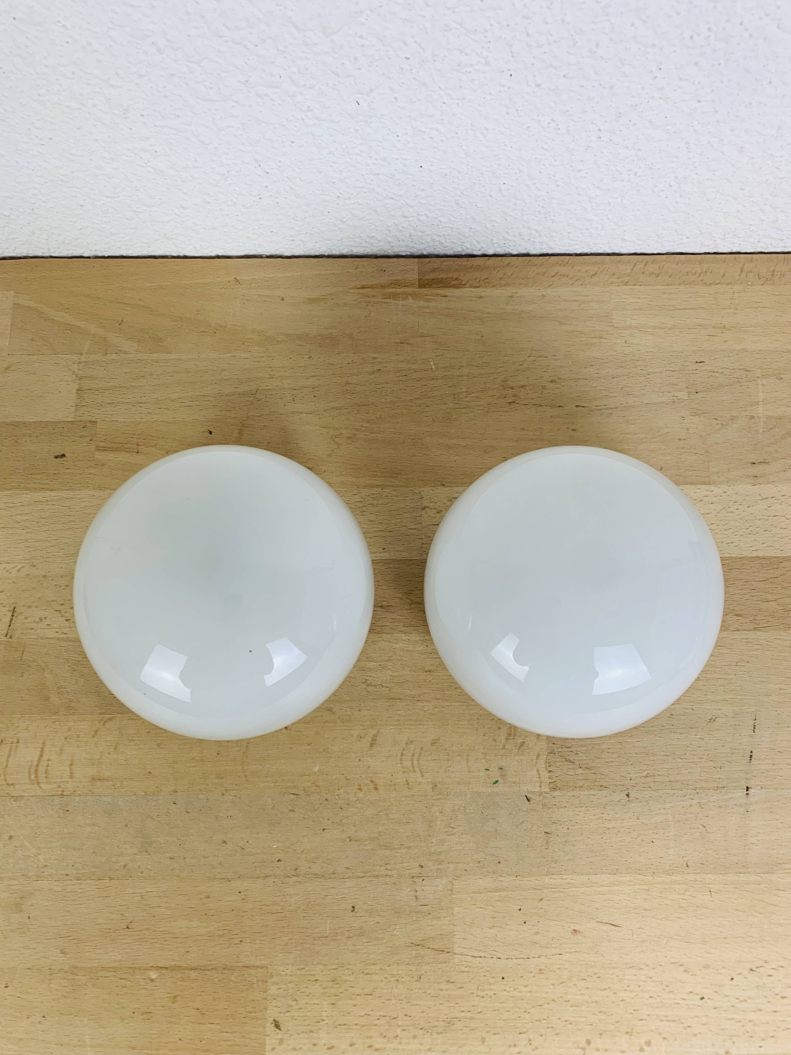 Pair of vintage opaline ball wall lights, 1960s