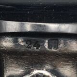 9 table knives in silver metal.