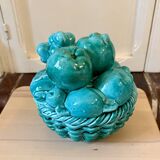 Vintage green earthenware plate/basket with fruit decorations.