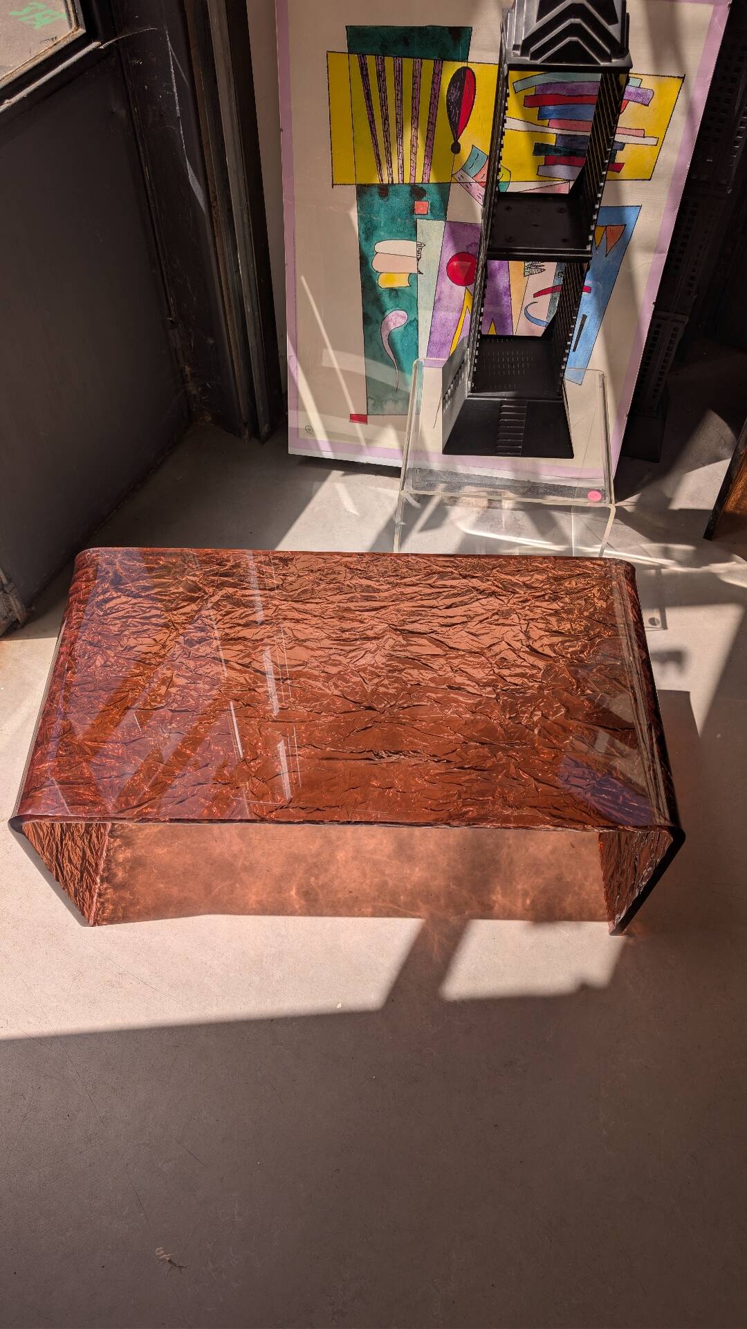 Smoked plexiglass coffee table