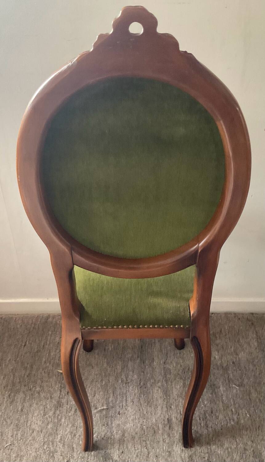 Antique wooden and velvet upholstered chair