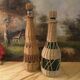 Bouteilles vintage rotin