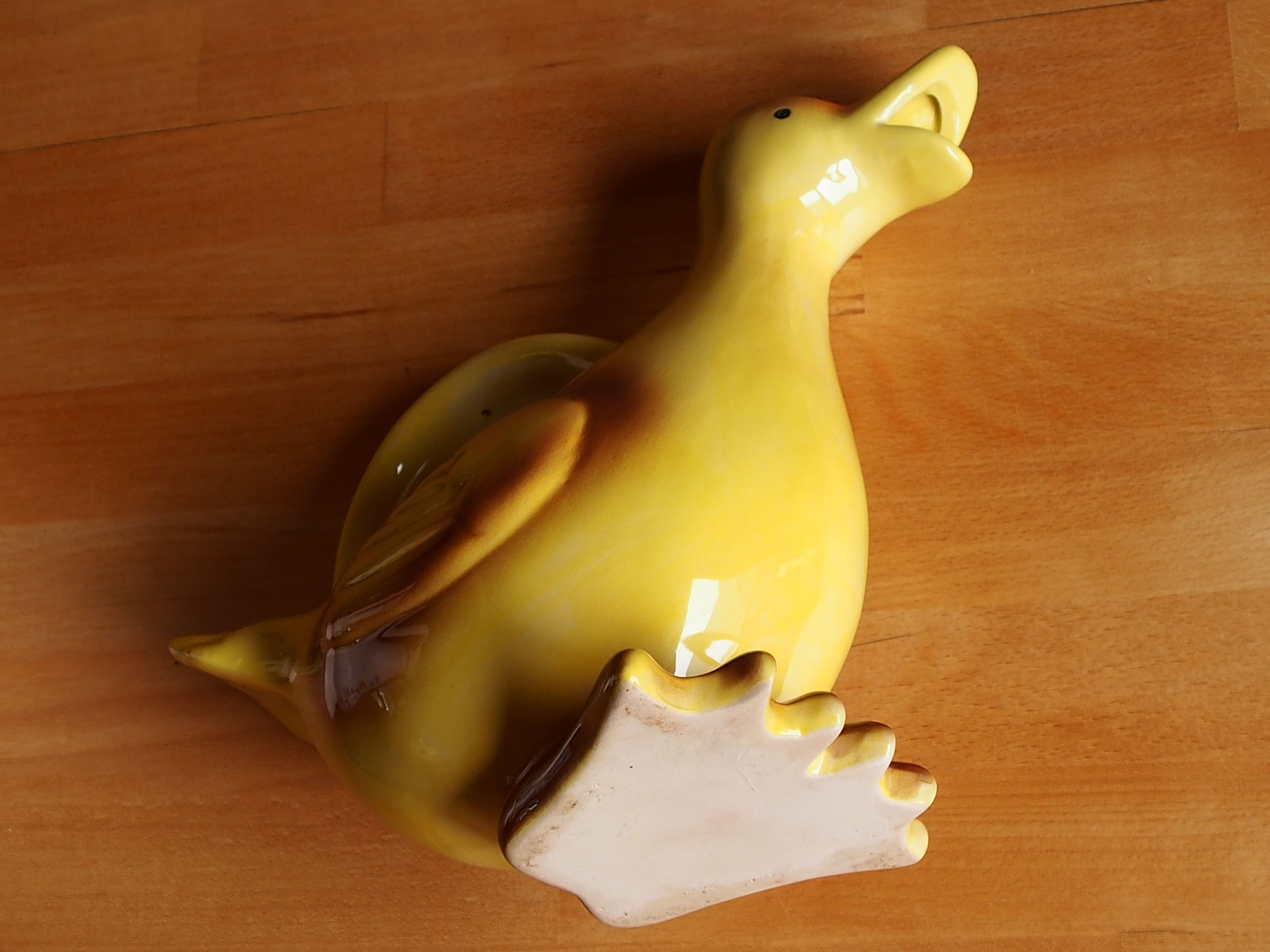 Ceramic watering can in white earthenware, yellow enamel and bird shape