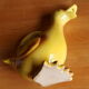 Ceramic watering can in white earthenware, yellow enamel and bird shape
