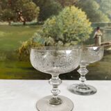 2 antique champagne glasses in engraved glass