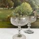 2 antique champagne glasses in engraved glass
