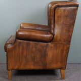 Fauteuil à oreilles en cuir de mouton