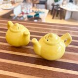 Salt and pepper shakers in the shape of a teapot.
