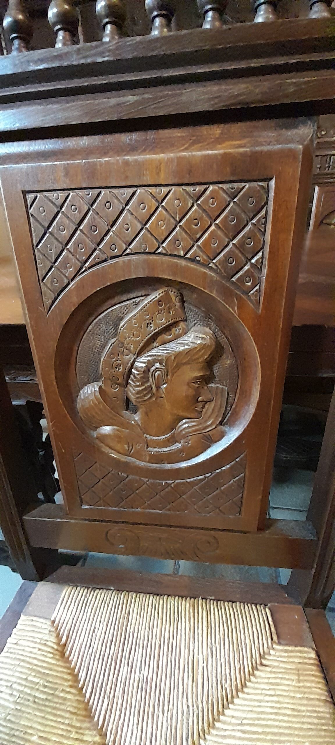 Breton dining room table with 2 extensions and 6 chairs with carved Breton characters