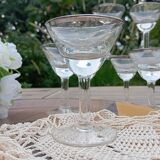 11 bottle-bottom bistro glasses with silver edging, early 20th century