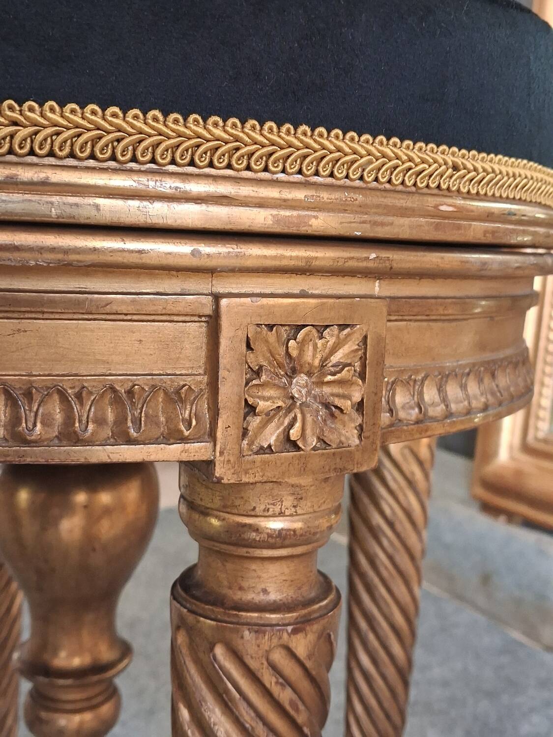 Golden wooden piano stool