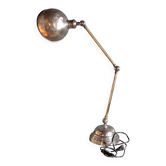 Old adjustable industrial lamp in bronze with 2 arms.