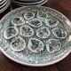 Set of 12 plates and an oyster dish or other in majolica.