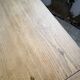 Oak farmhouse table with turned black legs.