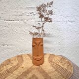 Face terracotta vase