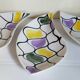 Three vintage free-form ceramic ravine dishes from the 1950s