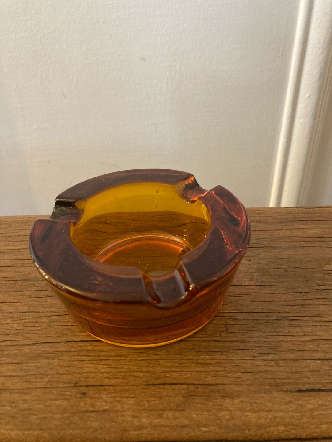 Amber glass ashtray