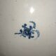 Old plate in Northern earthenware with blue floral decoration eighteenth century