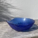 Blue glass shell emptier