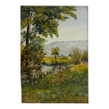 Old oil painting on wood of a lush landscape by Joseph Guénard.