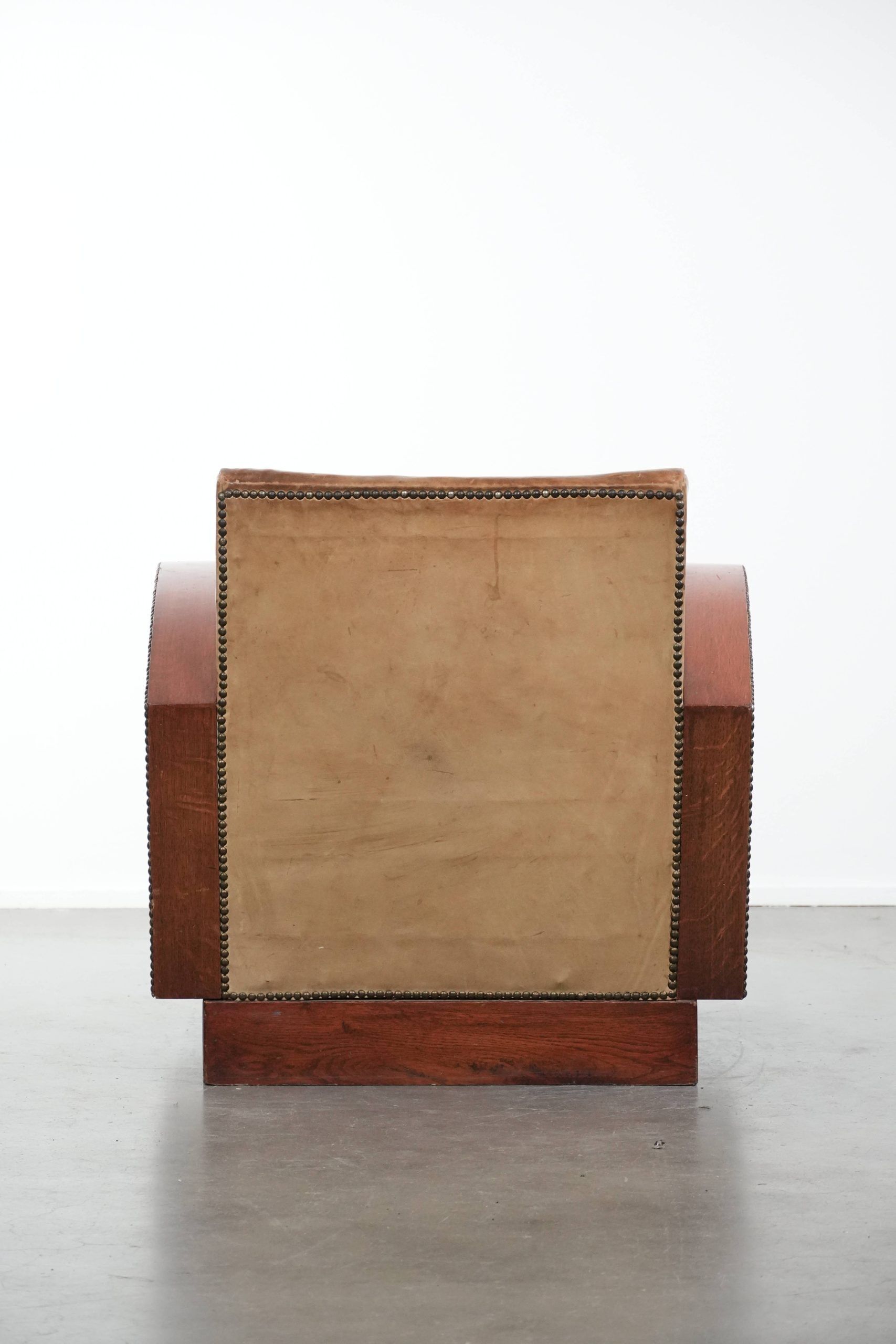 Art Deco design armchair made of cowhide leather in light cognac colour