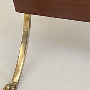 Magazine racks with claw feet by Maison Jansen