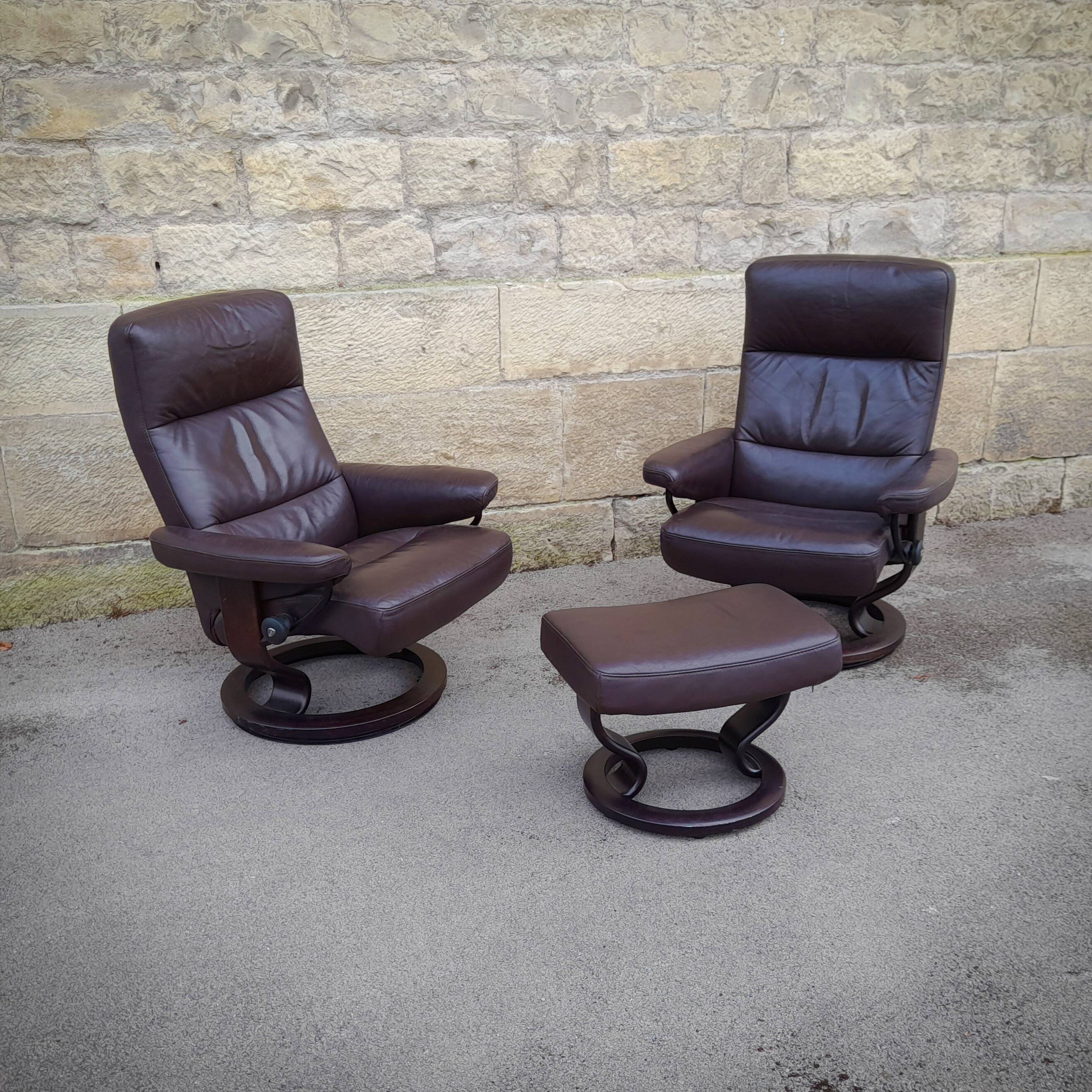 Pair of Scandinavian leather armchairs and ottoman, Ekornes, Norway, 1970s