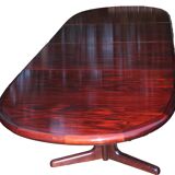 Midcentury extendable rosewood  dining table by edvard valentinsen