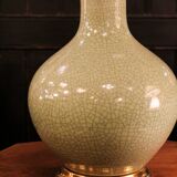 Ceramic lamp with a crackled celadon green finish.