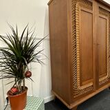 Rattan wardrobe with compass feet