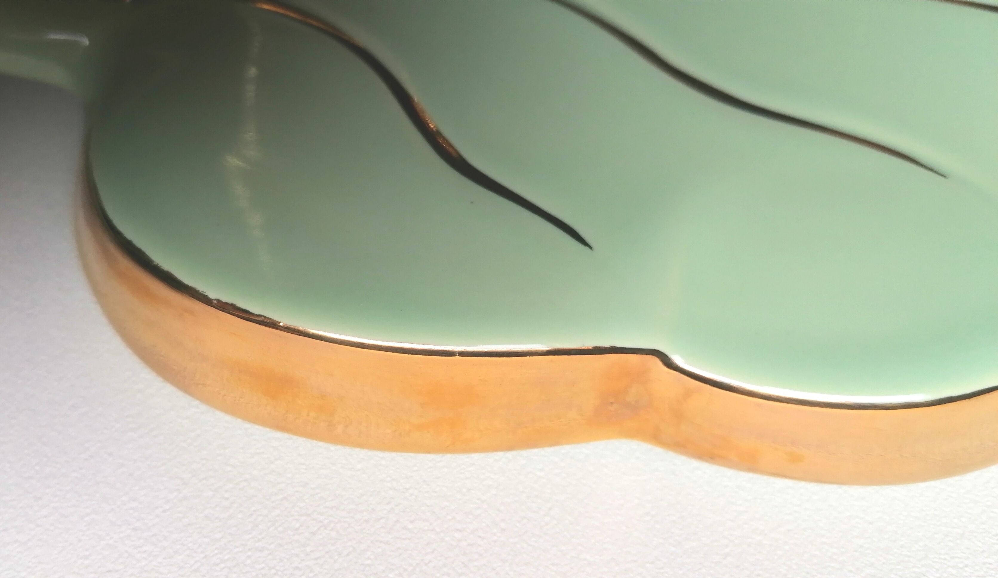 Celadon green leaf trivety and gilding
