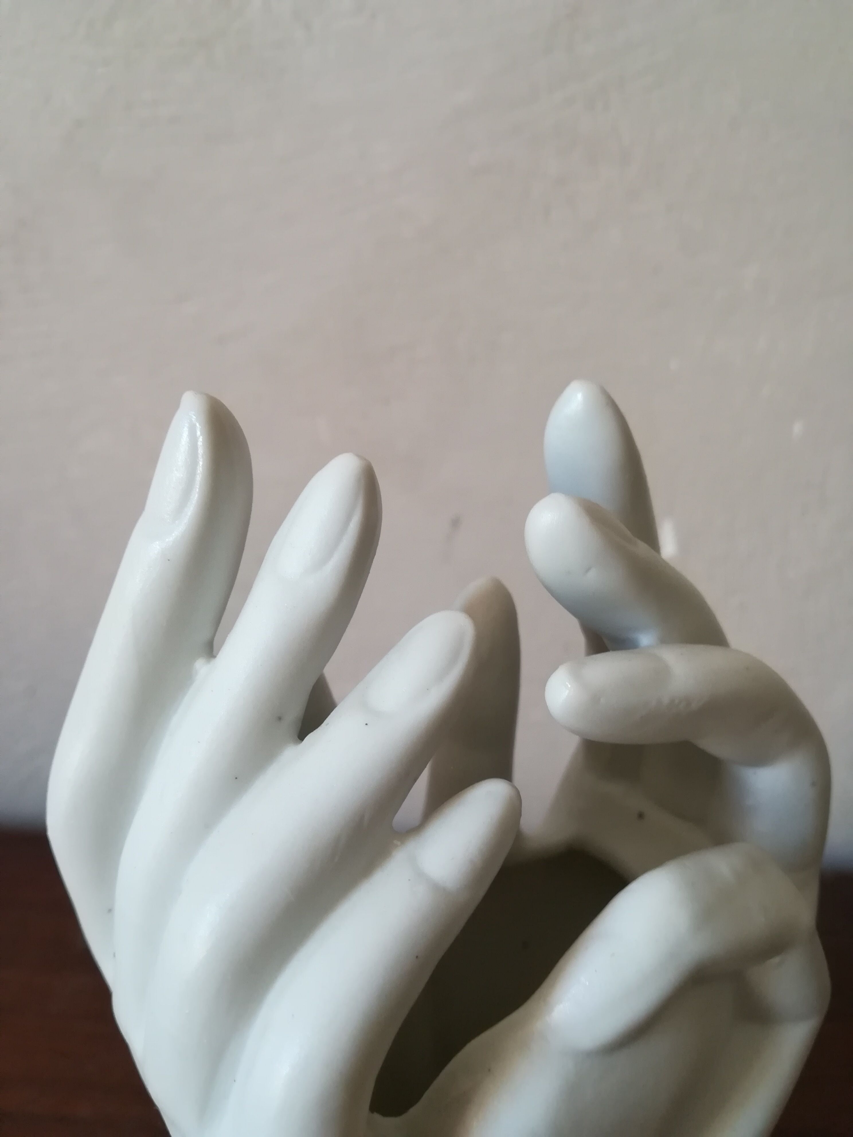 Vase hands in biscuit