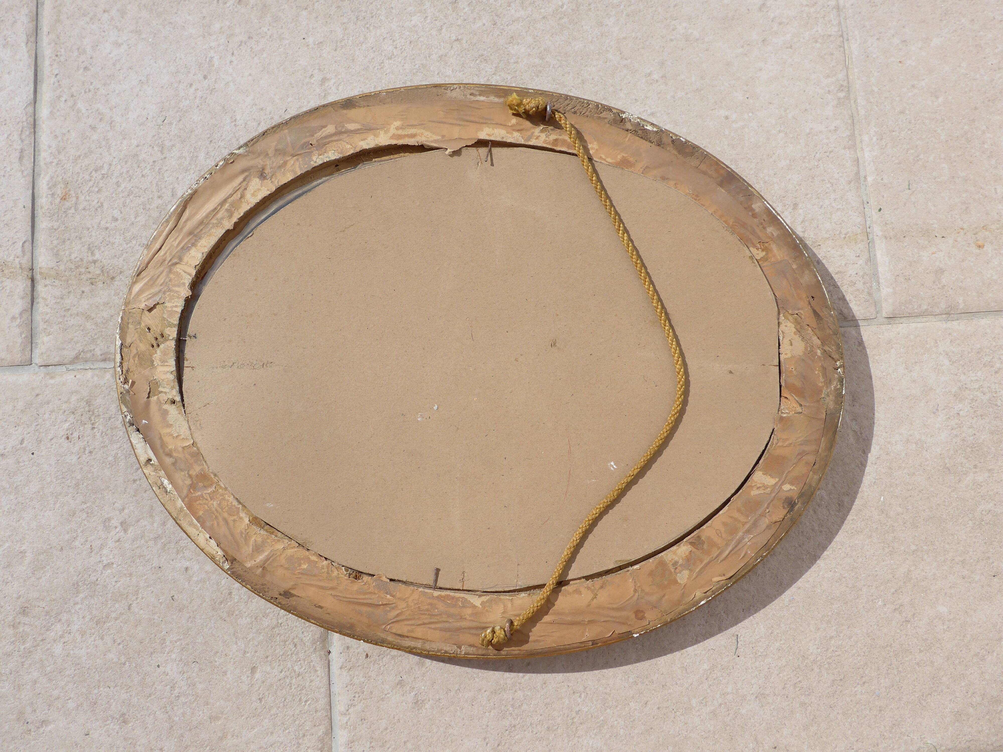 round frame gilded molding and glass