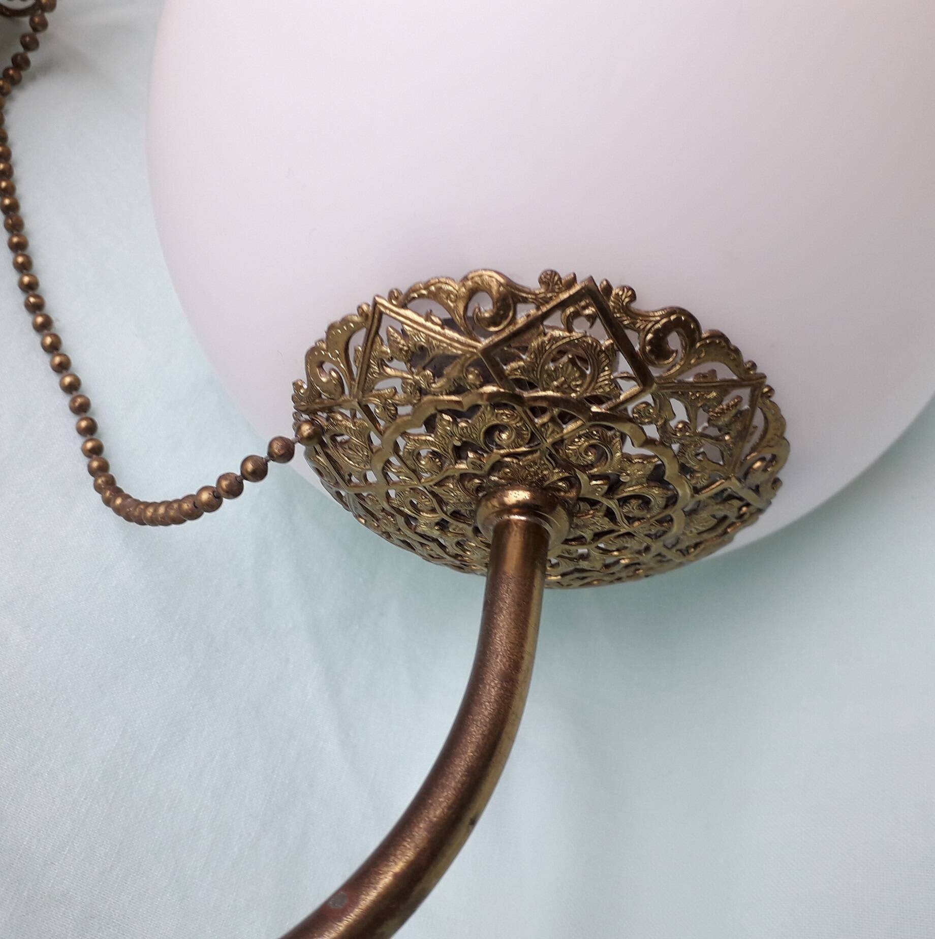 Pair of metal and opaline wall lights