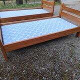 Pair of beds with twin box springs attributed to Maison Regain elm burl