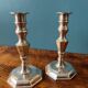 Pair of silver metal candlesticks