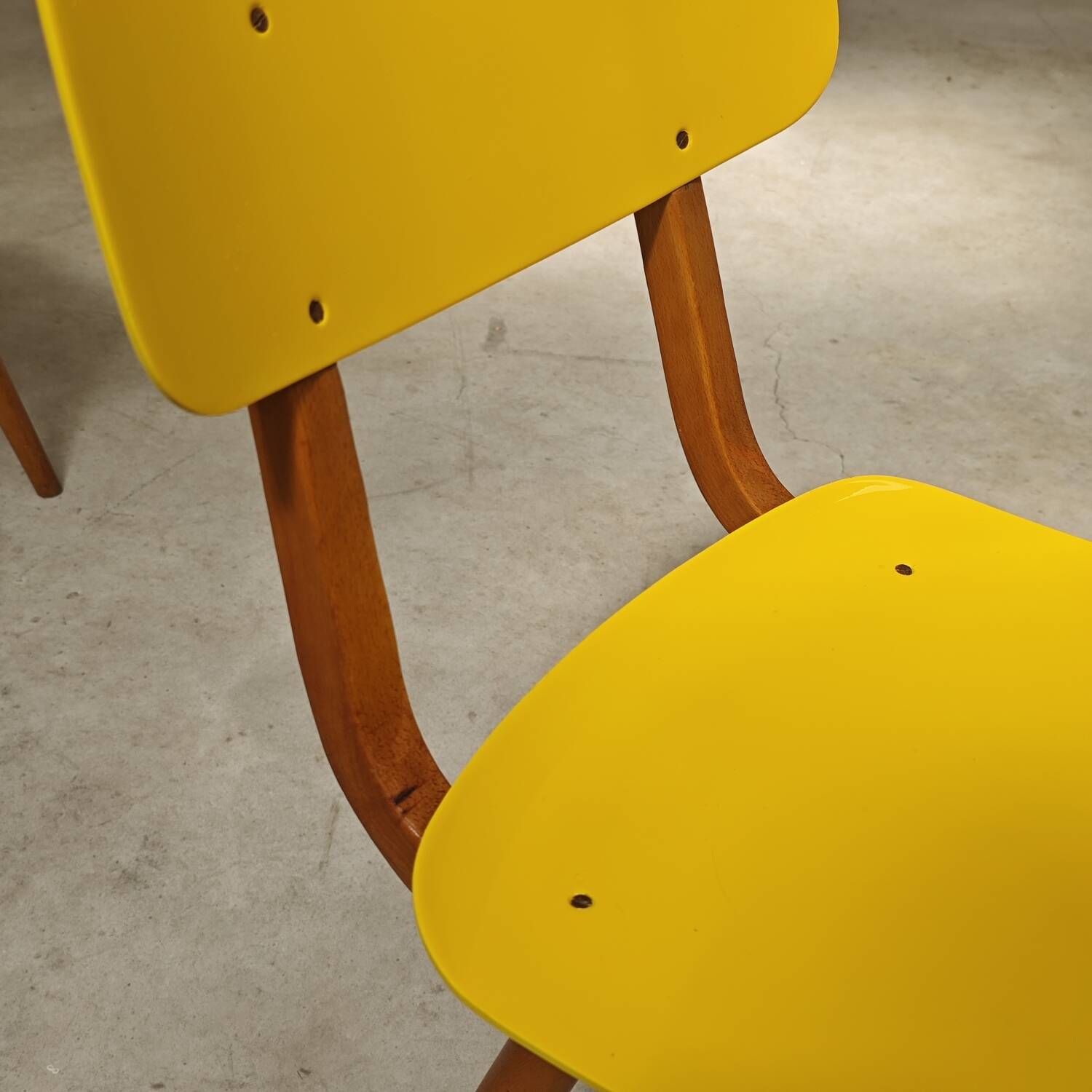 Pair of Ton Bystrice Thonet chairs in wood and yellow molded plastic