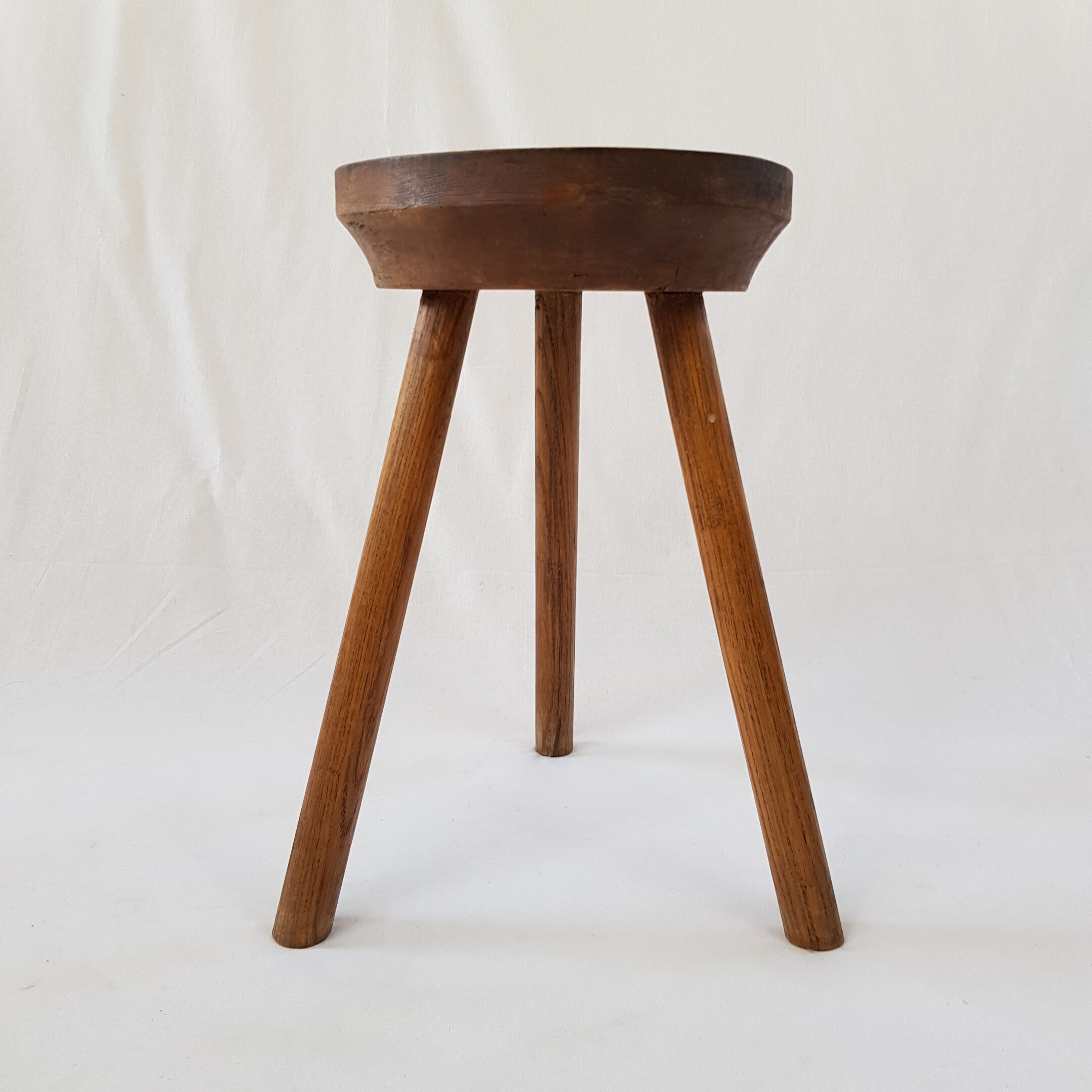 Wooden tripod stool
