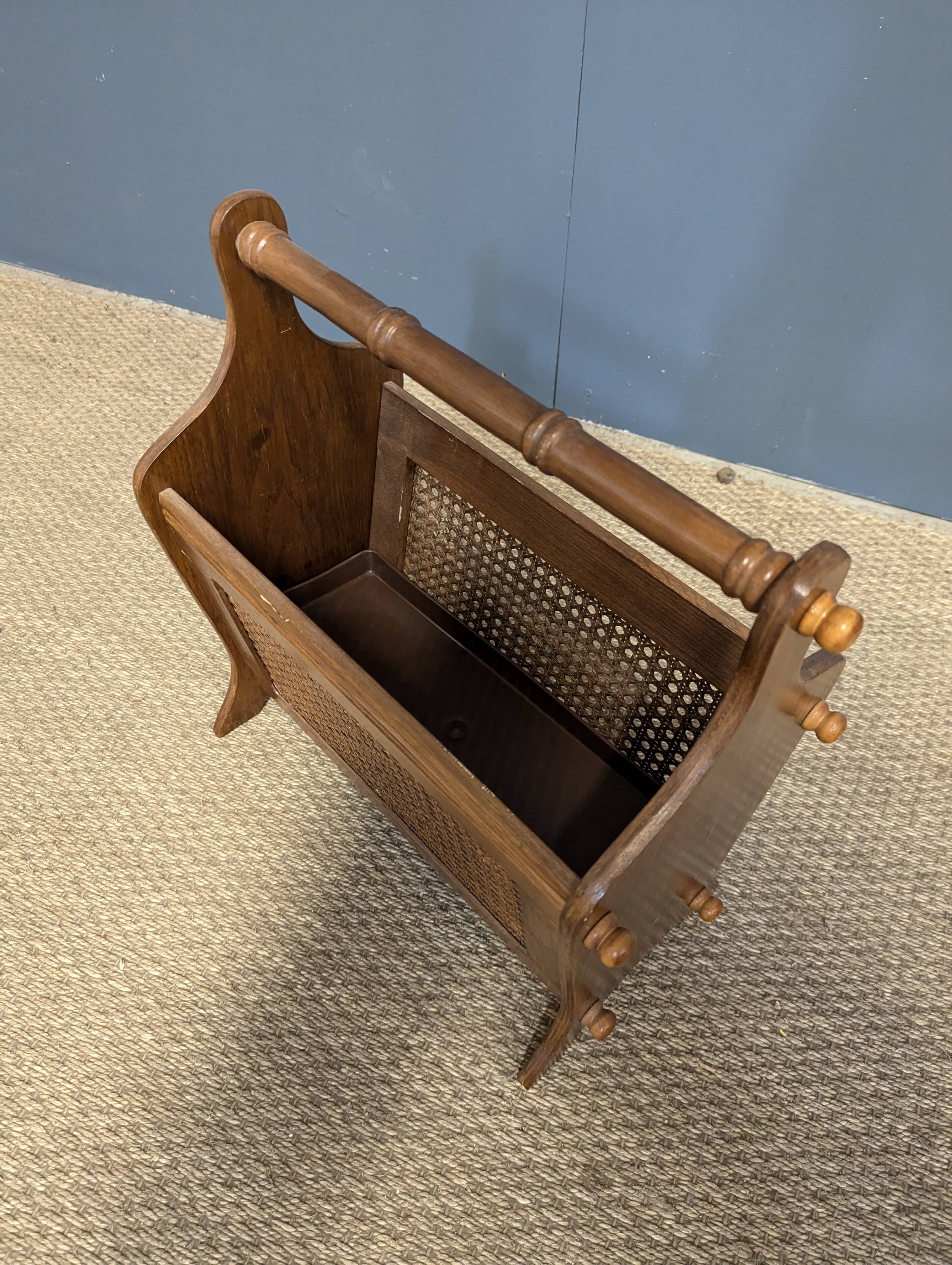 Wooden magazine rack with cane work