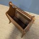 Wooden magazine rack with cane work