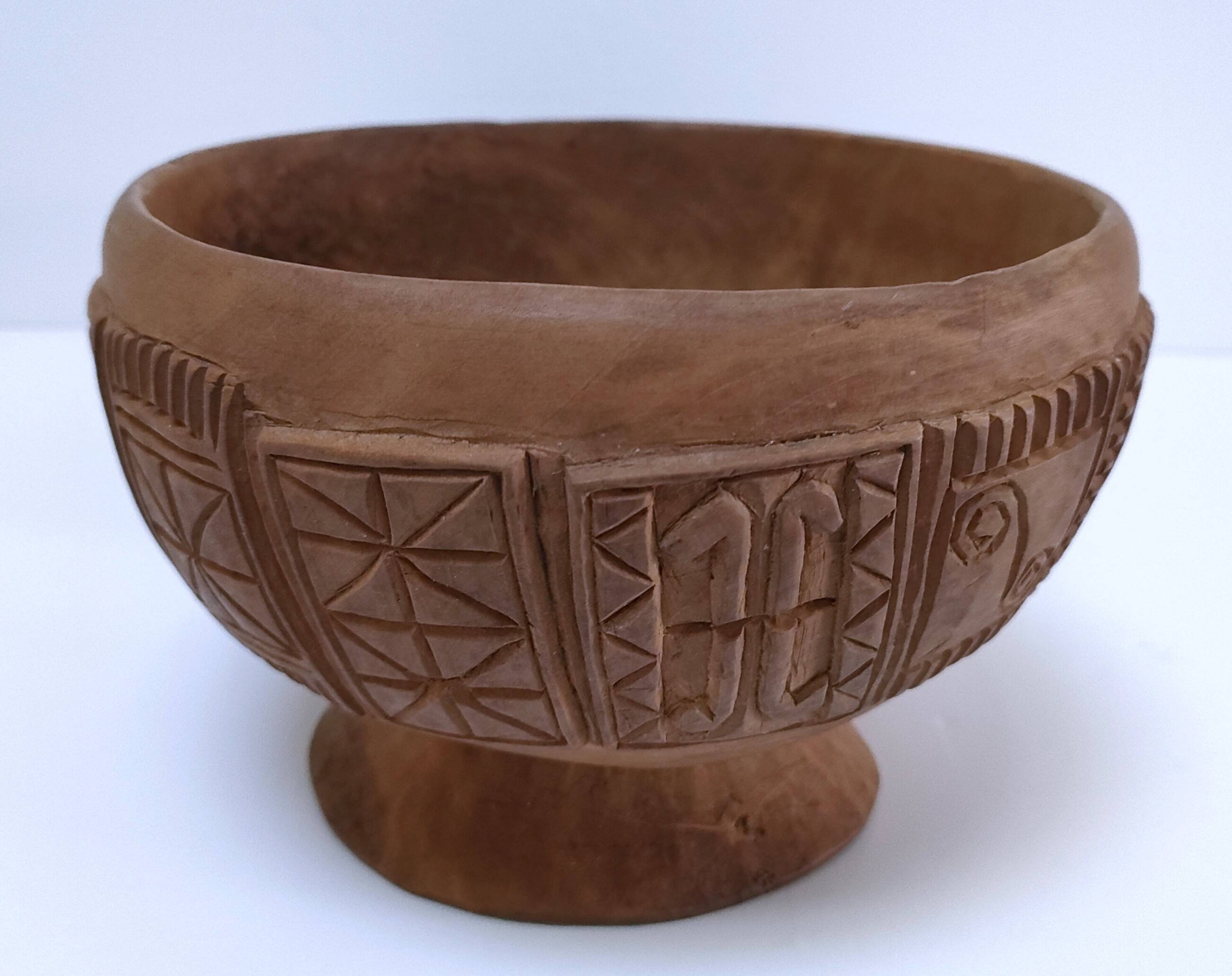four vintage solid wood bowls