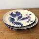 duo of porcelain dessert plates with hand-painted floral decoration