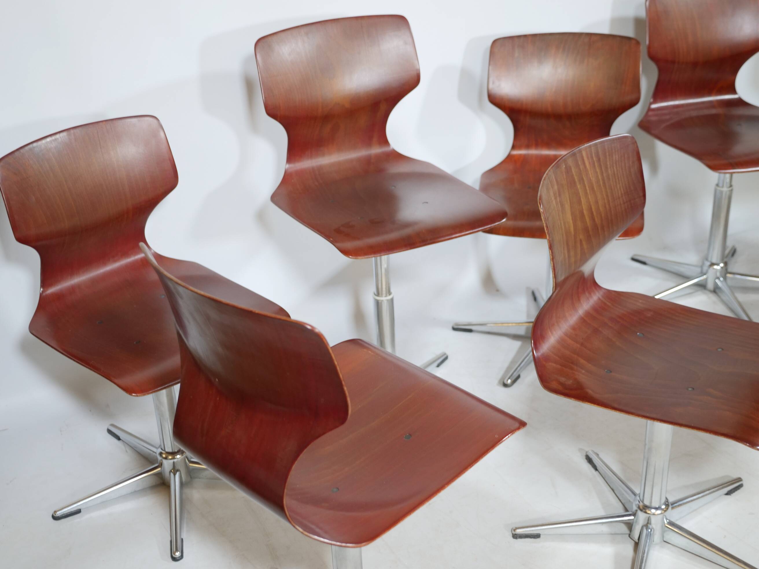 8 chaises pivotantes Flototto, années 70