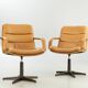 Pair of swivel armchairs by Geoffrey Harcourt.