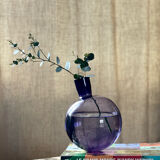 Purple vase inclined